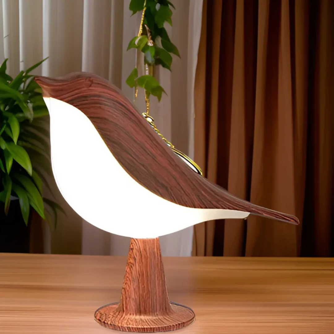Stylish LED bird lamp with touch control, ambient lighting, and essential oil aromatherapy diffuser.