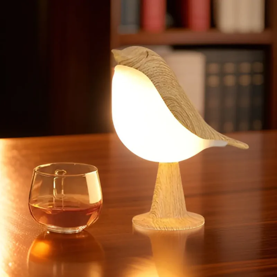 Wireless FeatherGlow LED bird lamp, combining elegant design, touch control, and soothing aromatherapy.