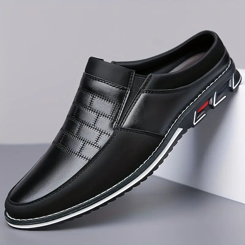 Stylish men's black slip-on mules, perfect casual or dress footwear for everyday comfort & versatility.
