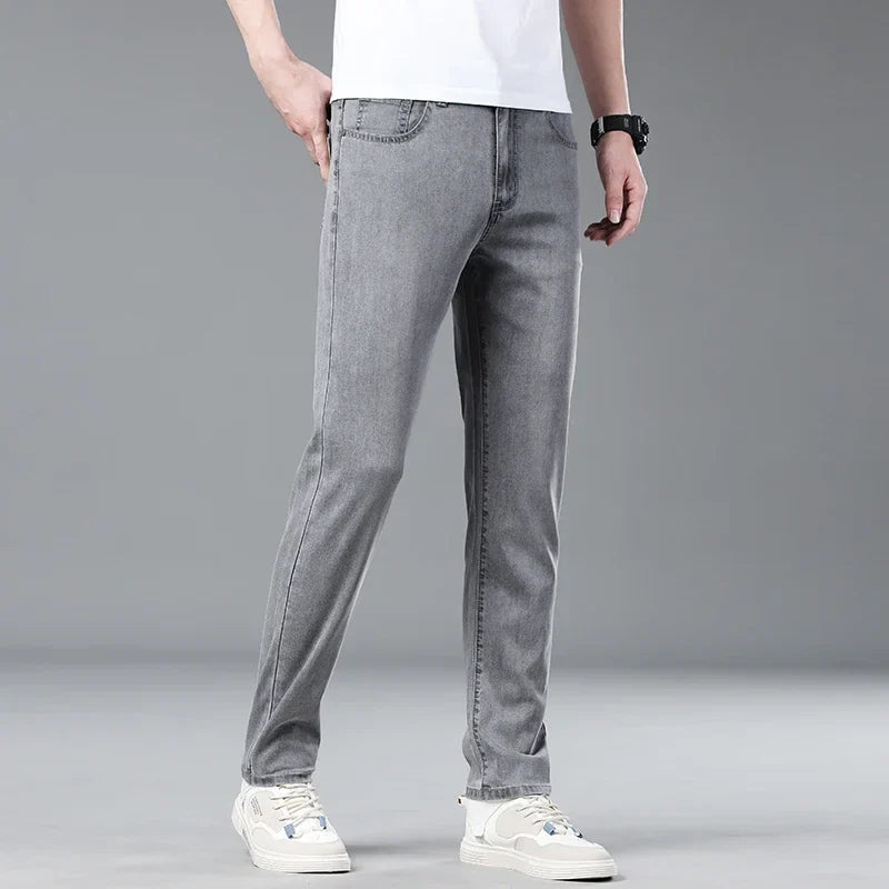 Deep blue men's straight fit denim jeans, combining modern style with everyday comfort.