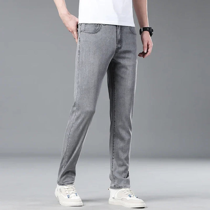 Deep blue men's straight fit denim jeans, combining modern style with everyday comfort.