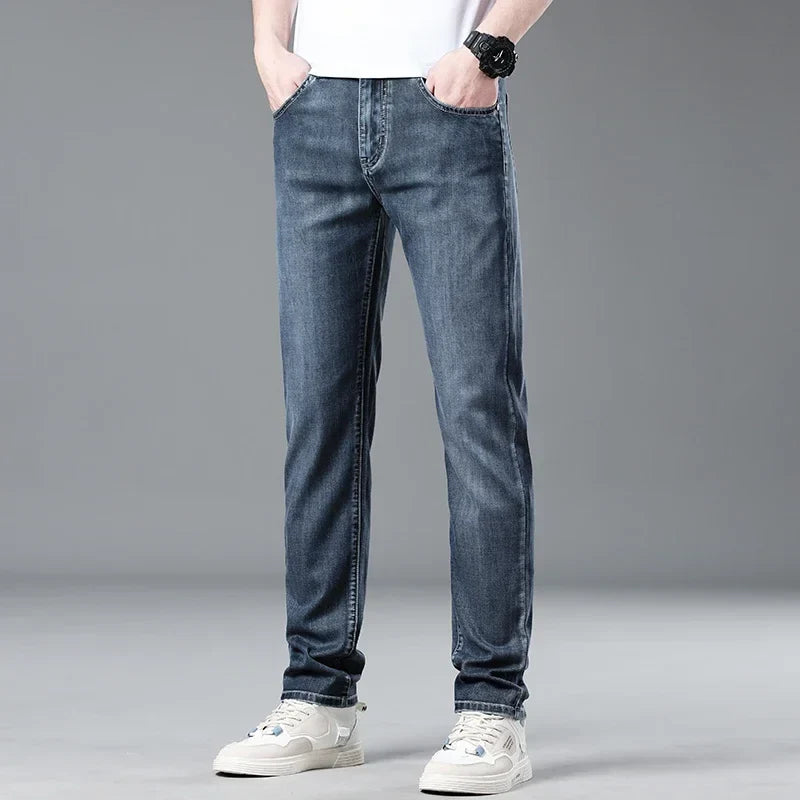 Fashionable men's straight fit jeans in a classic blue wash, enhancing any casual outfit.