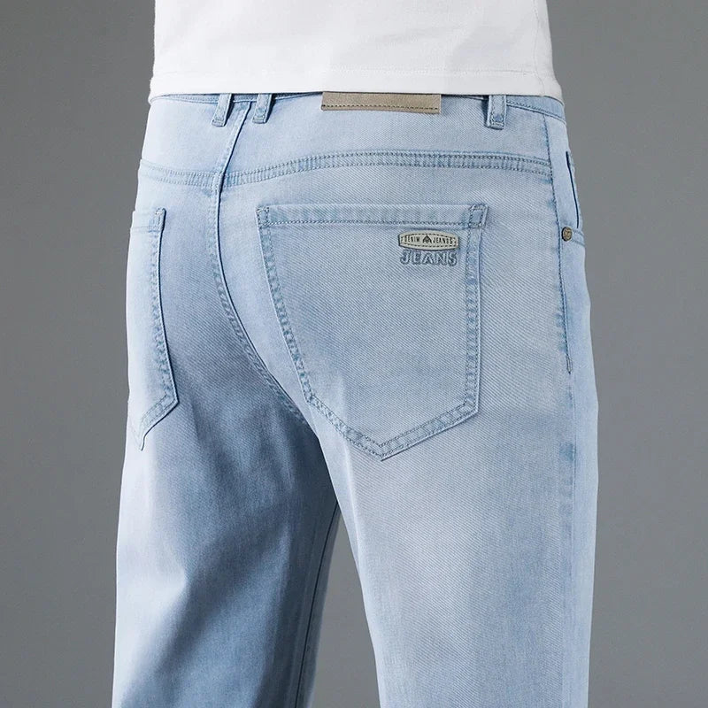 Comfortable men's straight fit gray denim jeans, designed for relaxed style and everyday fashion.