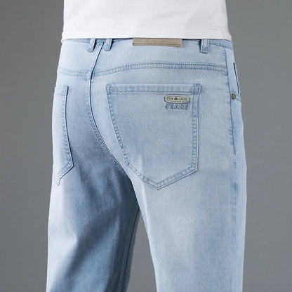 Comfortable men's straight fit gray denim jeans, designed for relaxed style and everyday fashion.