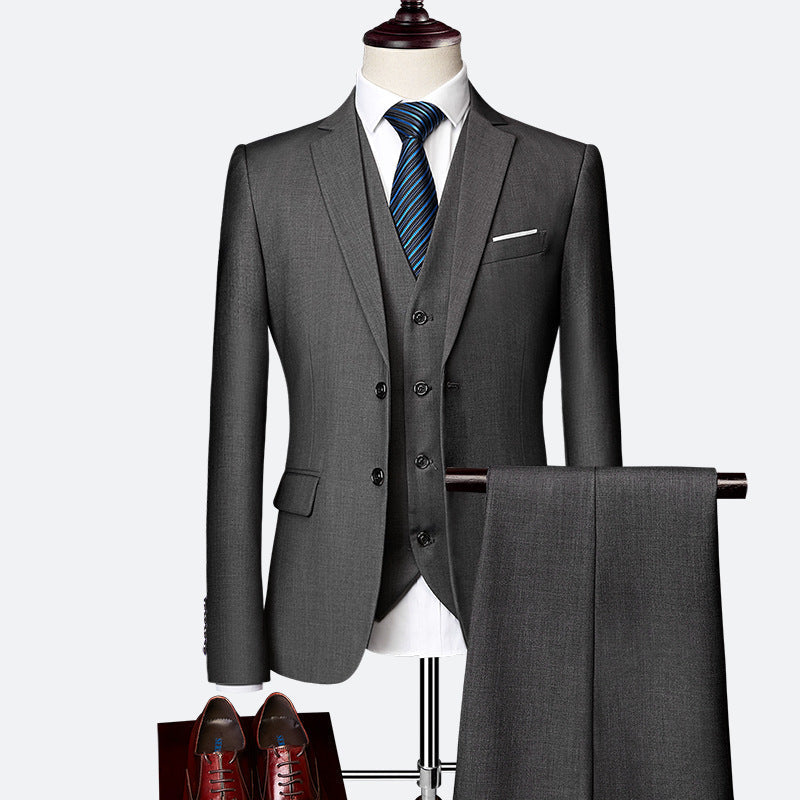 Elegant men's three-piece suit jacket & trousers. Tailored formal menswear for weddings, galas, and professional events.