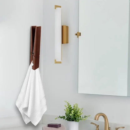 Oversized wooden hook, ideal for hanging towels in a stylish bathroom or organizing kitchen space.