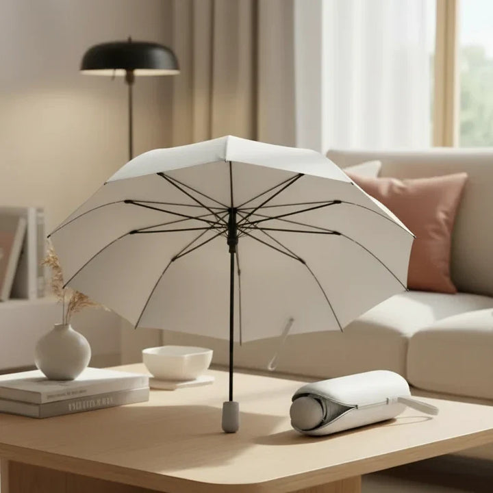 Stylish unisex black compact travel umbrella for portable rain protection and daily use.