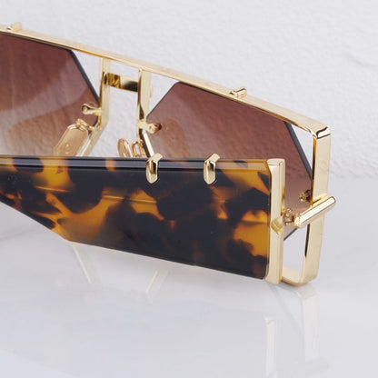 Modern light blue hexagon sunglasses, offering full UV400 protection. Chic unisex eyewear for any style.