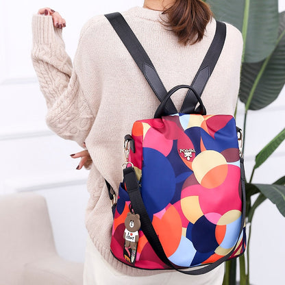 Stylish women's anti-theft backpack in PU leather, water-resistant with secure multi-pocket design for daily travel.