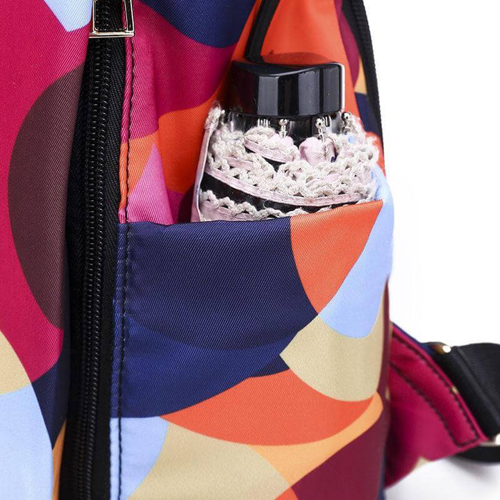 Travel-friendly anti-theft women's backpack, water-resistant, with secure compartments for your essentials.