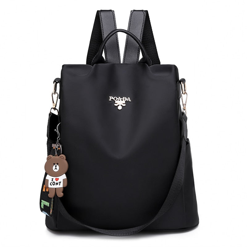 Woman wearing a secure water-resistant anti-theft travel backpack, ideal for adventures.