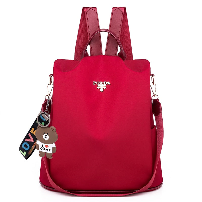 Modern woman commuting with a fashionable anti-theft daypack, a stylish and secure shoulder bag.