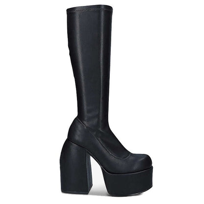 Stylish women's black heeled ankle boots, perfect for an edgy look. Ideal for fall & winter fashion.