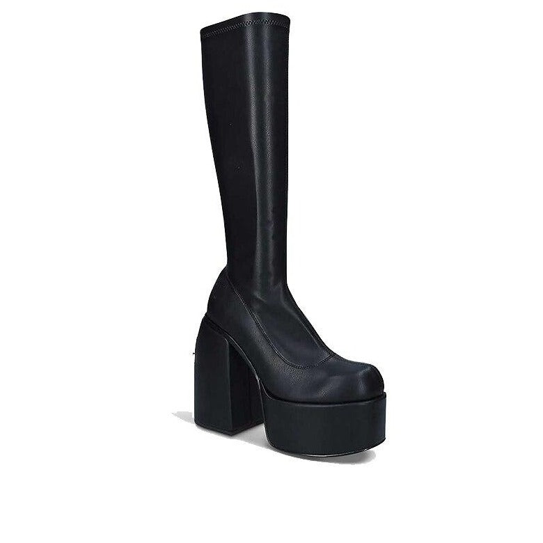 Edgy black leather heeled ankle boots for women, featuring a sleek design. Versatile women's footwear.