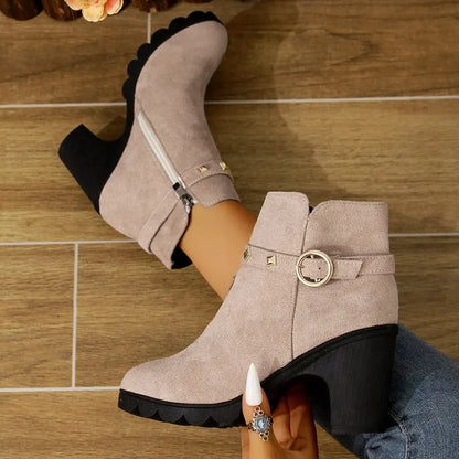 Stylish women's studded ankle boots with a comfortable block heel, ideal for everyday chic looks.