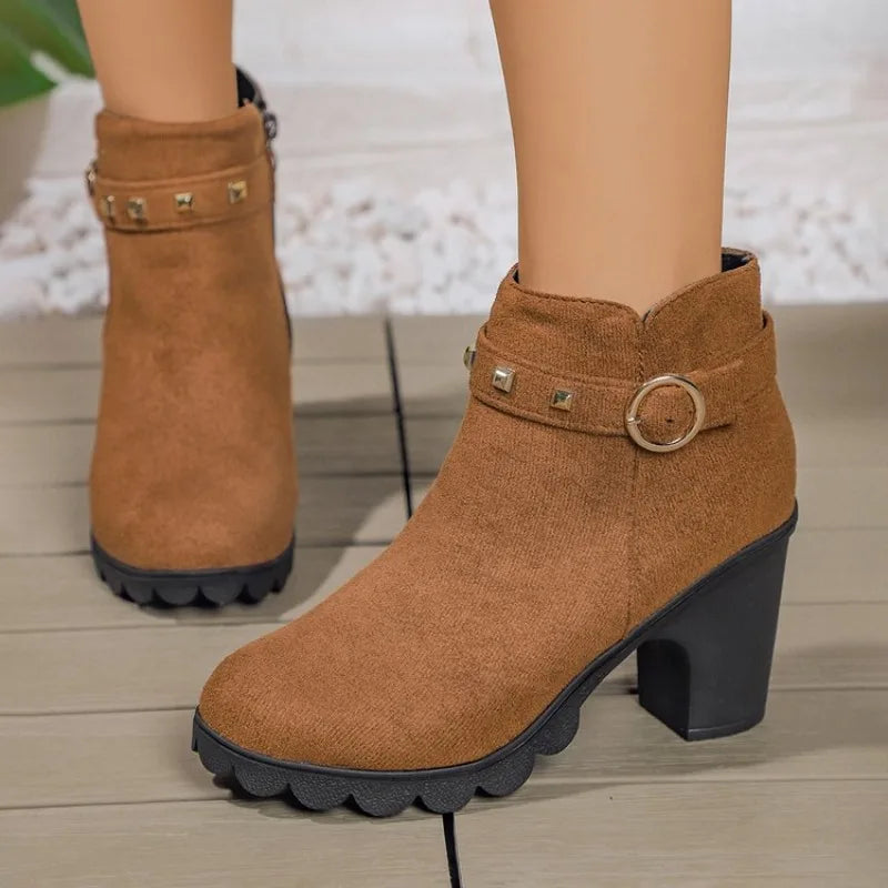 Comfortable women's studded ankle boots with a block heel, a must-have for winter fashion statements.