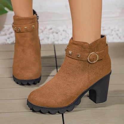 Comfortable women's studded ankle boots with a block heel, a must-have for winter fashion statements.