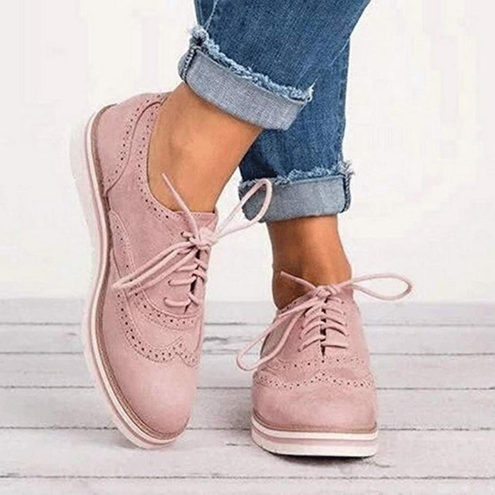 Stylish women's brogue oxford lace-up sneakers, perfect for casual comfort and everyday wear.