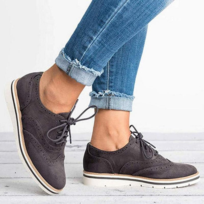 Versatile women's brogue lace-up sneakers, blending classic oxford style with modern comfort for daily wear.