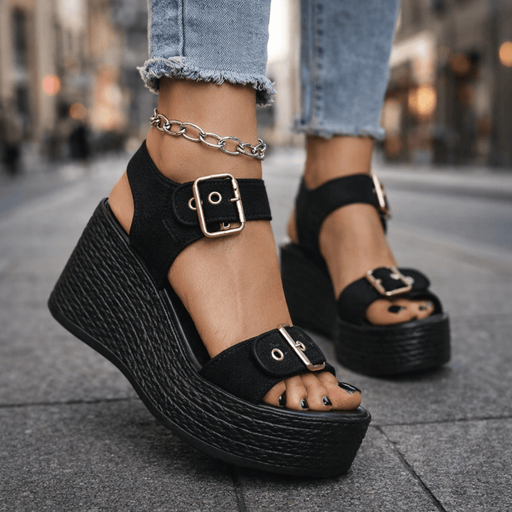 Open-toe women's platform wedge sandals with stylish buckles, perfect for comfortable summer fashion.