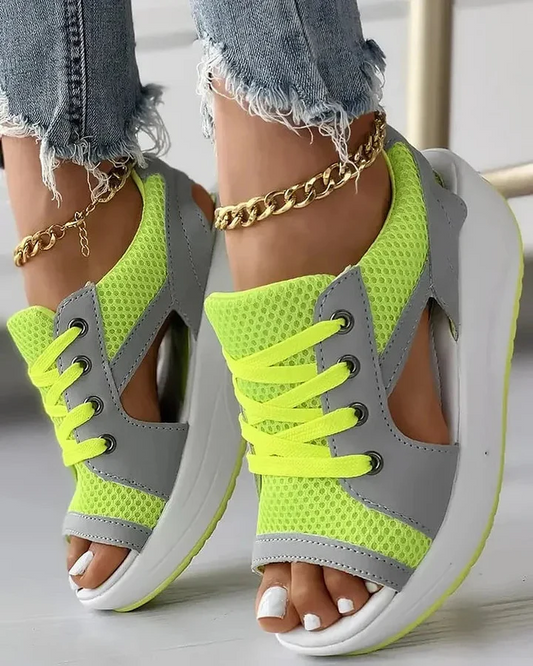 Stylish women's contrast cutout platform sandals with lace-up detail, perfect for summer fashion footwear.