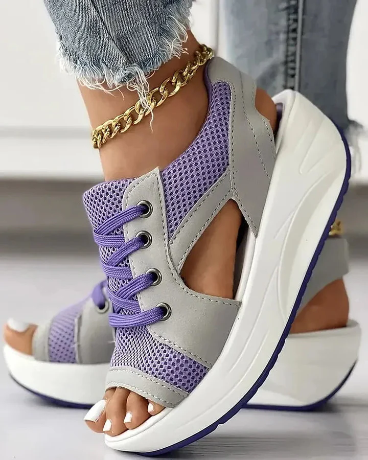 Trendy women's platform sandals with contrast cutout details, lace-up design, ideal for summer outfits.
