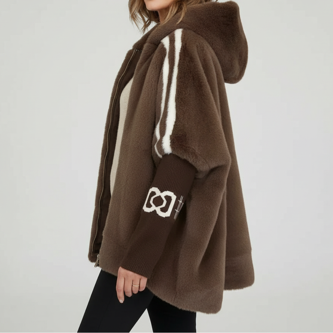 Relaxed fit women's hooded parka jacket with a faux fur trim hood, ideal for cozy winter fashion and everyday wear.