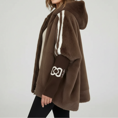 Relaxed fit women's hooded parka jacket with a faux fur trim hood, ideal for cozy winter fashion and everyday wear.