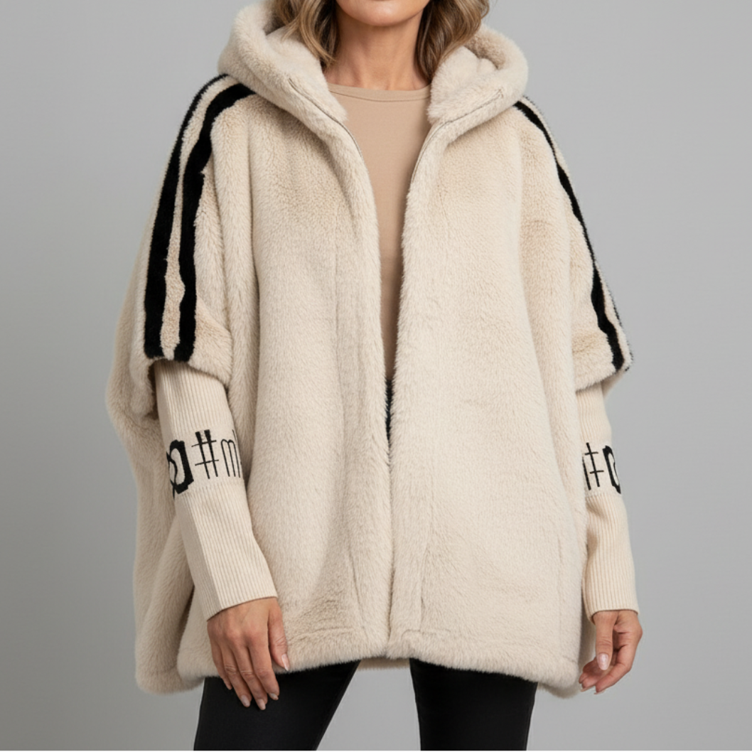 Elegant women's hooded winter parka jacket in a neutral color, offering a relaxed fit and cozy warmth for cold weather.