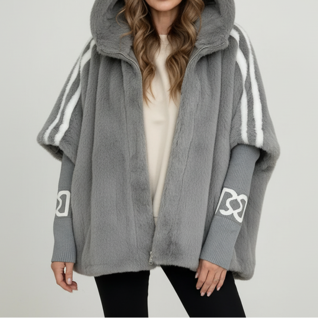 Back view of a stylish women's cozy hooded winter parka jacket, showcasing its relaxed fit and warm cold weather design.