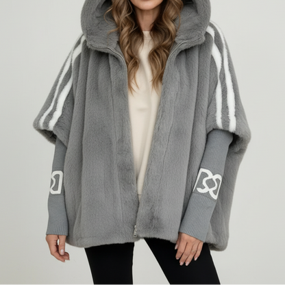 Back view of a stylish women's cozy hooded winter parka jacket, showcasing its relaxed fit and warm cold weather design.