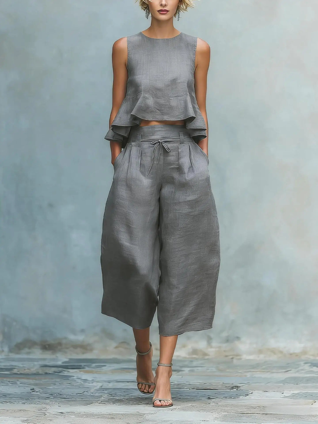 Fashionable women's crop top & flowing wide leg pant set. Ideal casual summer pant suit two-piece for travel.