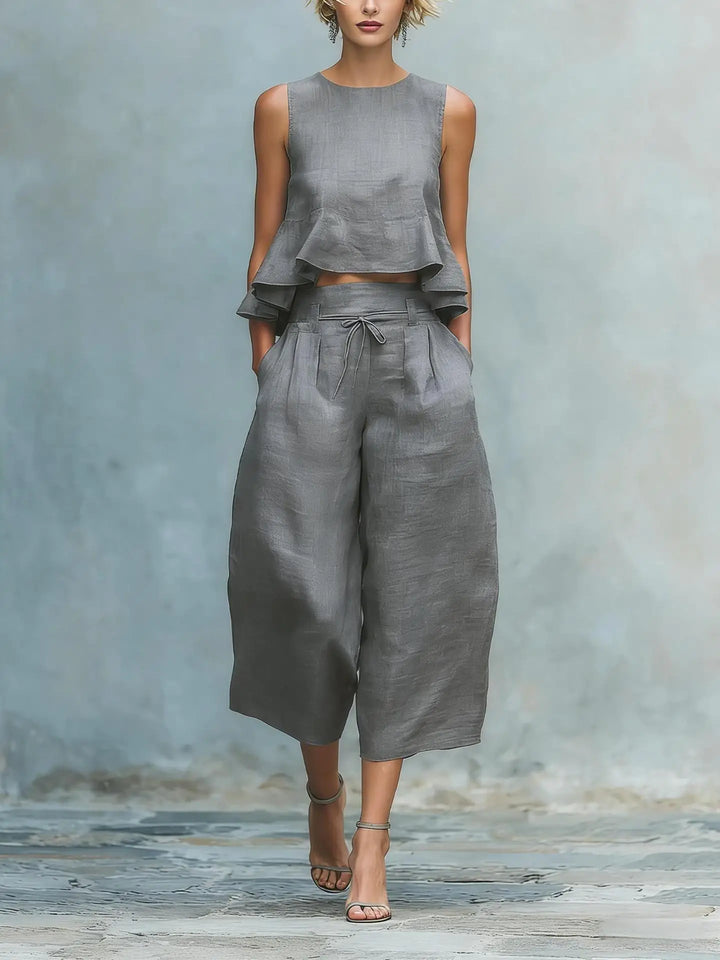 Fashionable women's crop top & flowing wide leg pant set. Ideal casual summer pant suit two-piece for travel.