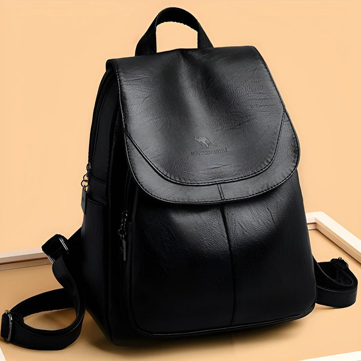 High-quality women's leather daily backpack. This chic rucksack is a perfect fashion accessory for any outfit.