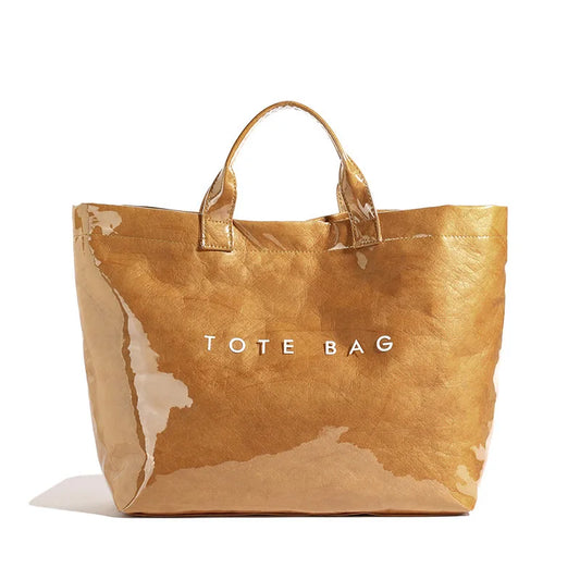 Stylish women's high-gloss everyday tote bag, perfect for daily use. Durable and versatile carryall handbag.