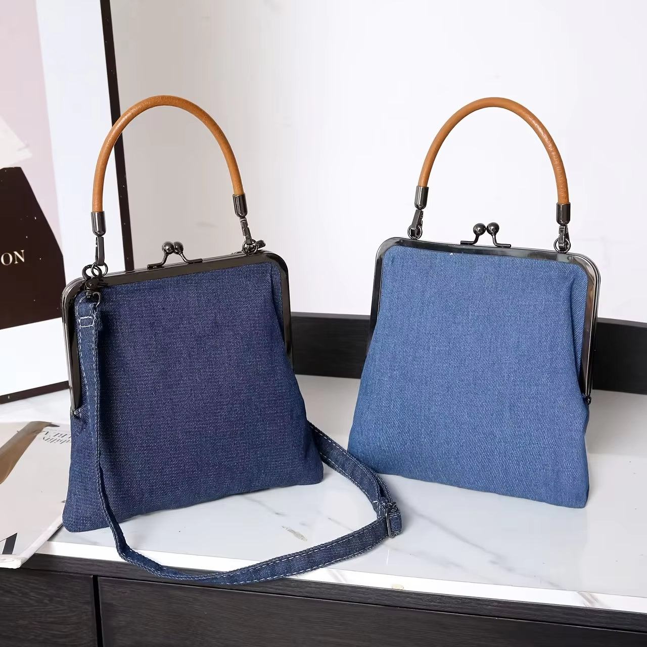 Chic women's denim shoulder bag featuring genuine leather trim, a practical and fashionable accessory.