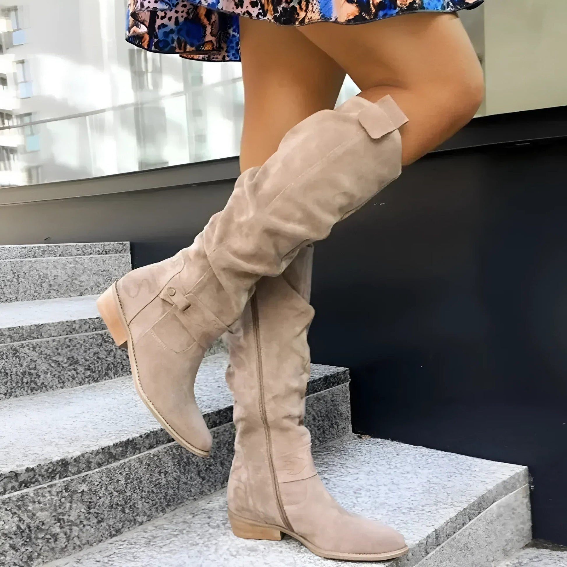 Stylish women's knee high boots with convenient side zipper, perfect for elegant fall & winter fashion.
