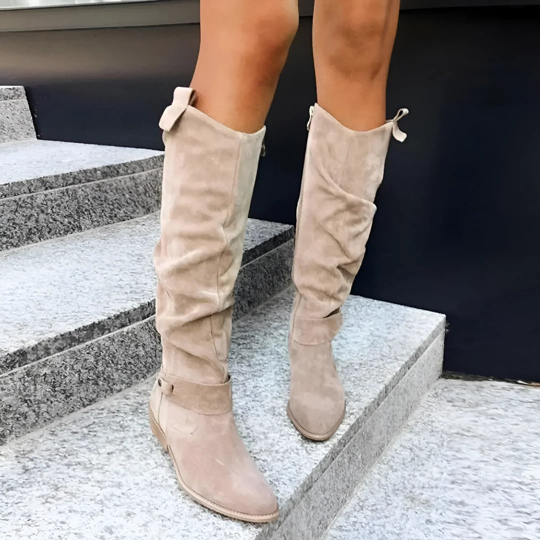 Fashionable women's tall boots. Elegant knee high design with side zipper for effortless fall & winter styling.