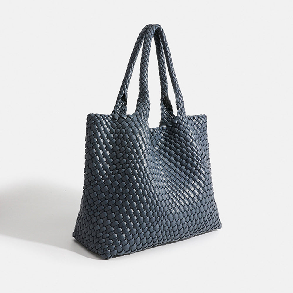 Elegant women's large woven tote bag. Stylish faux leather shoulder carryall, a chic daily handbag.