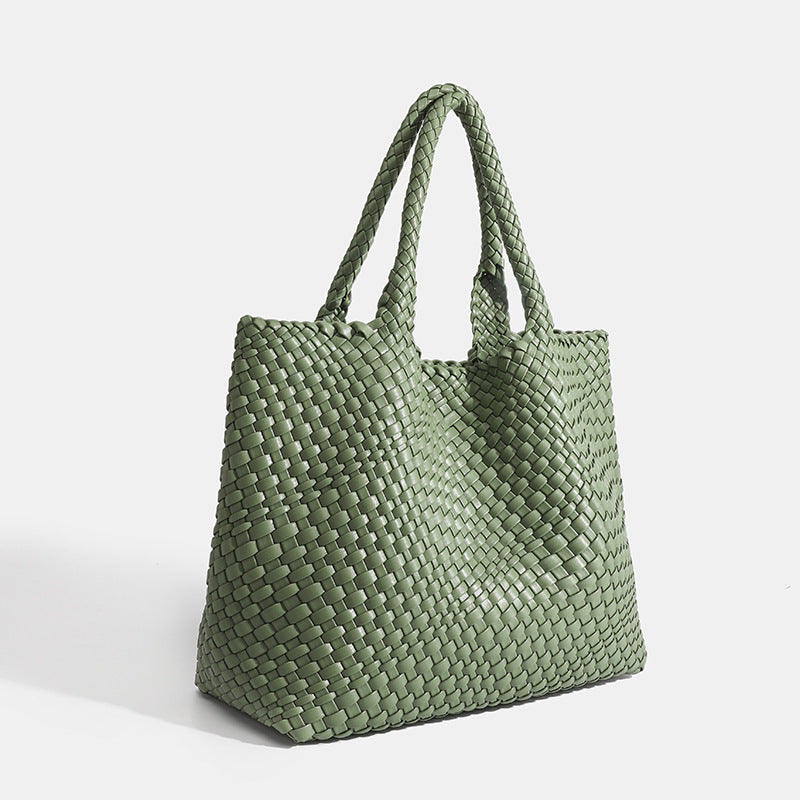 Structured large woven tote bag for women. Stylish faux leather shoulder carryall, perfect daily handbag.