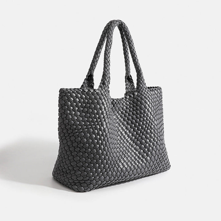 Spacious women's woven tote bag. Large faux leather shoulder carryall, ideal for daily essentials.