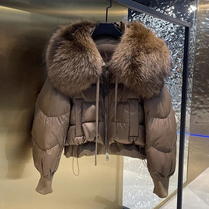Stylish women's lightweight puffer jacket, perfect fall & winter outerwear. Provides warm, everyday comfort.