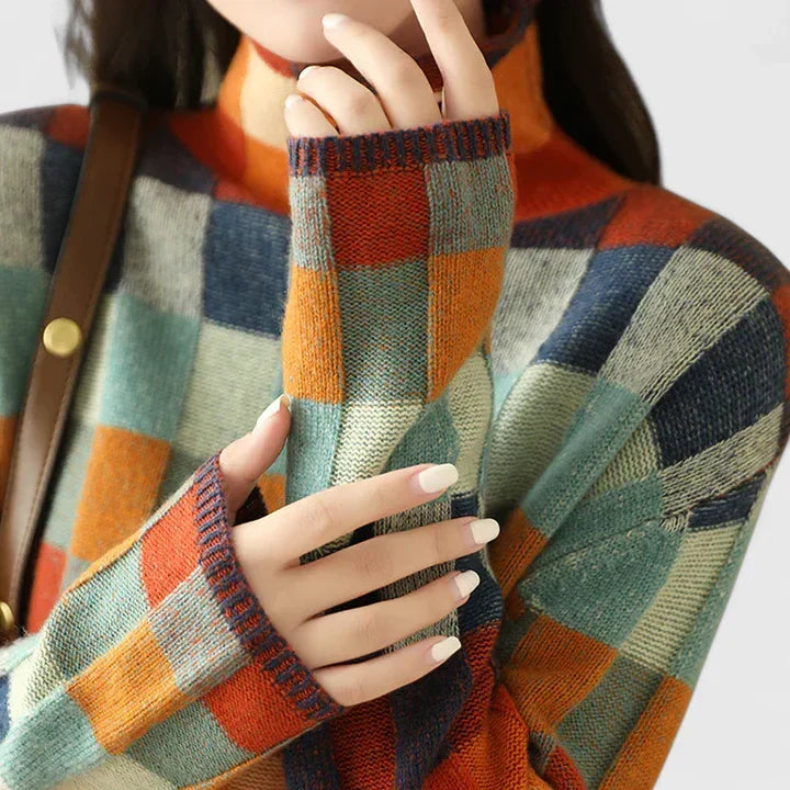 Women's multicolored check pattern sweater, a stylish pullover for autumn fashion & everyday casual wear.