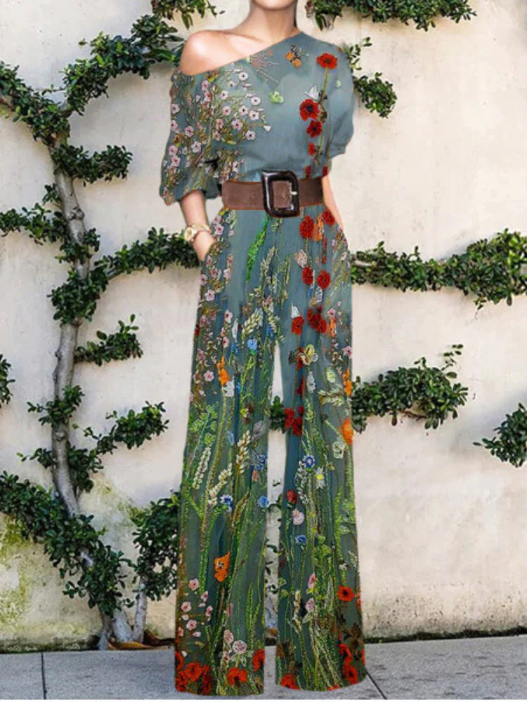 Comfortable women's printed one-shoulder wide-leg jumpsuit, great for vacation outfits & resort wear.