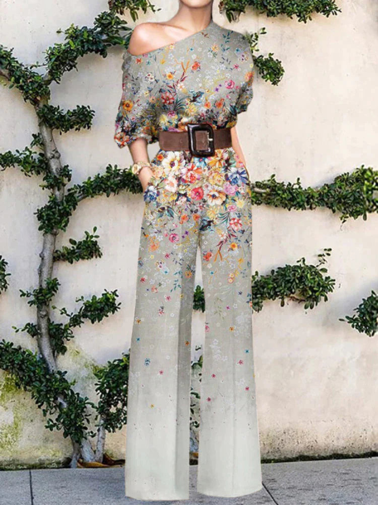 Statement one-shoulder printed wide-leg jumpsuit for women. Embrace stylish summer fashion and elegance.