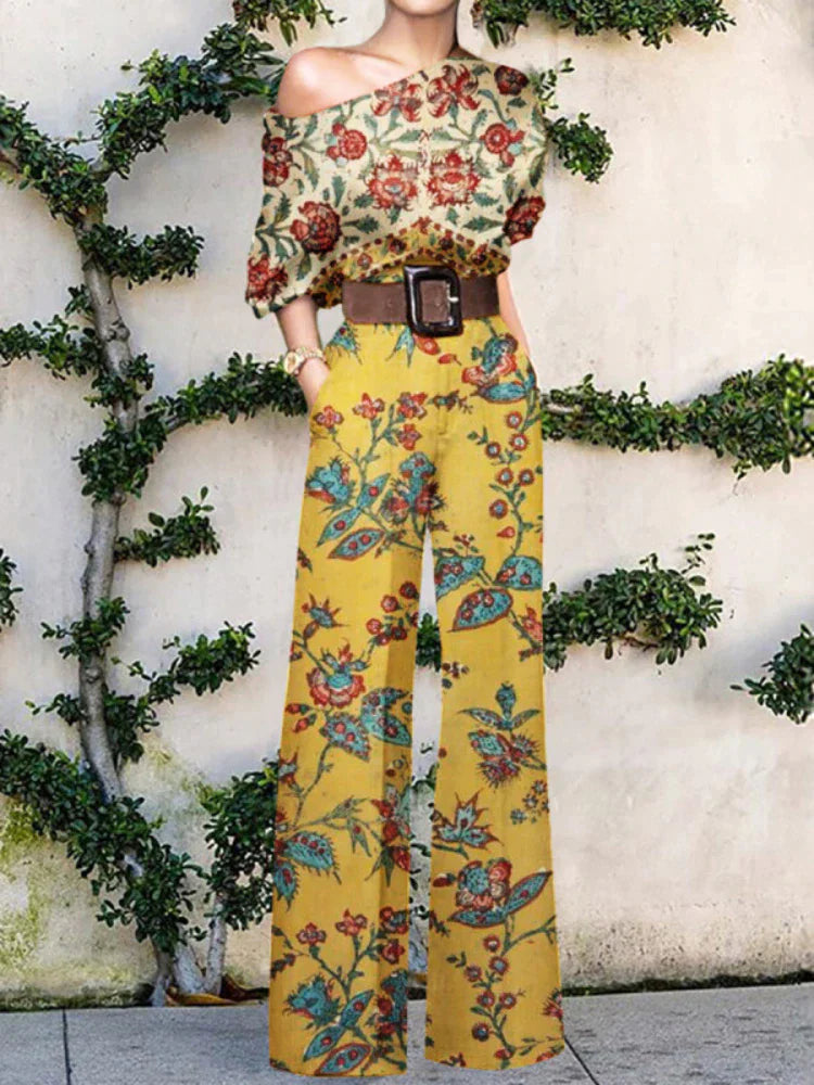 Flowy women's one-shoulder wide-leg jumpsuit with a unique print. Stylish for summer and elegant events.