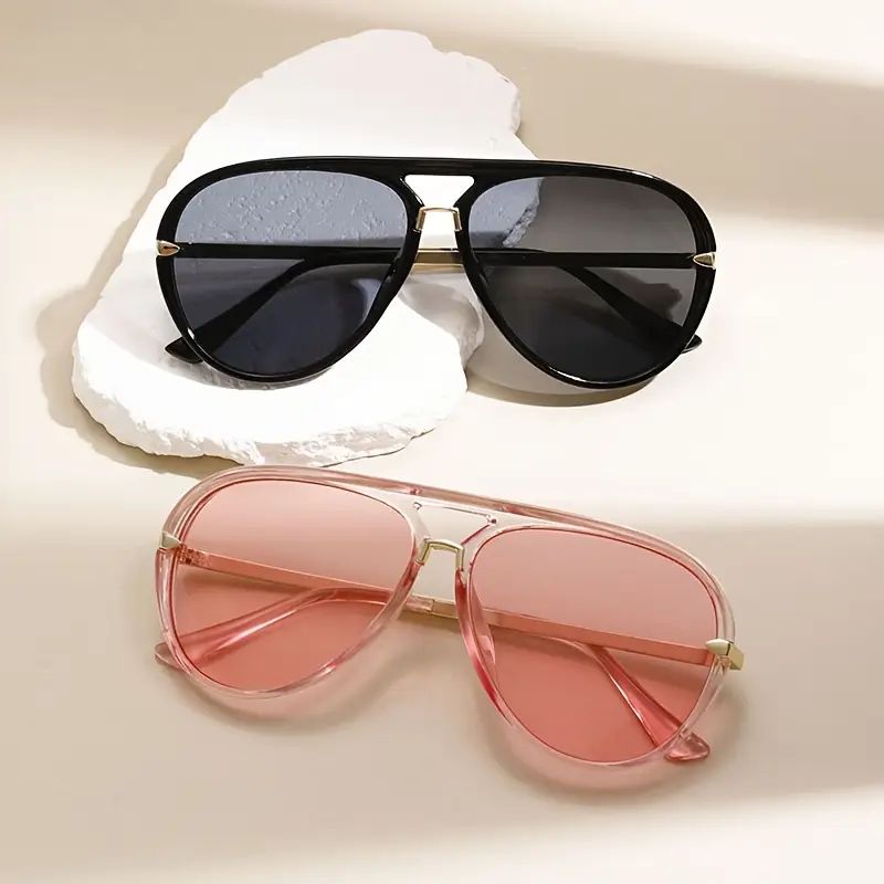 Stylish women's oversized aviator sunglasses with metal frame, a perfect fashion accessory.