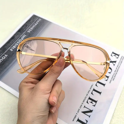 Versatile women's oversized aviator sunglasses, a chic fashion accessory offering UV400 protection.
