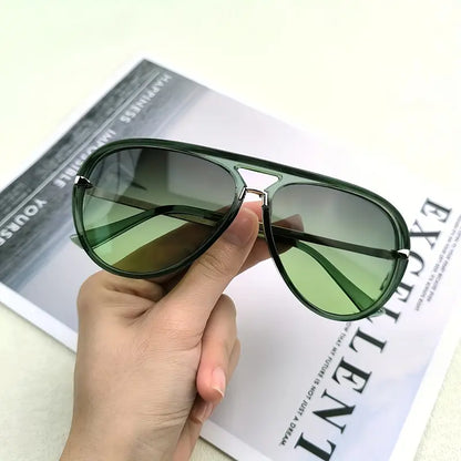 Stylish women's oversized aviator sunglasses featuring a durable metal frame and UV400 protection.