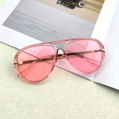 Modern women's oversized aviator sunglasses, UV400 eyewear for stylish summer protection.